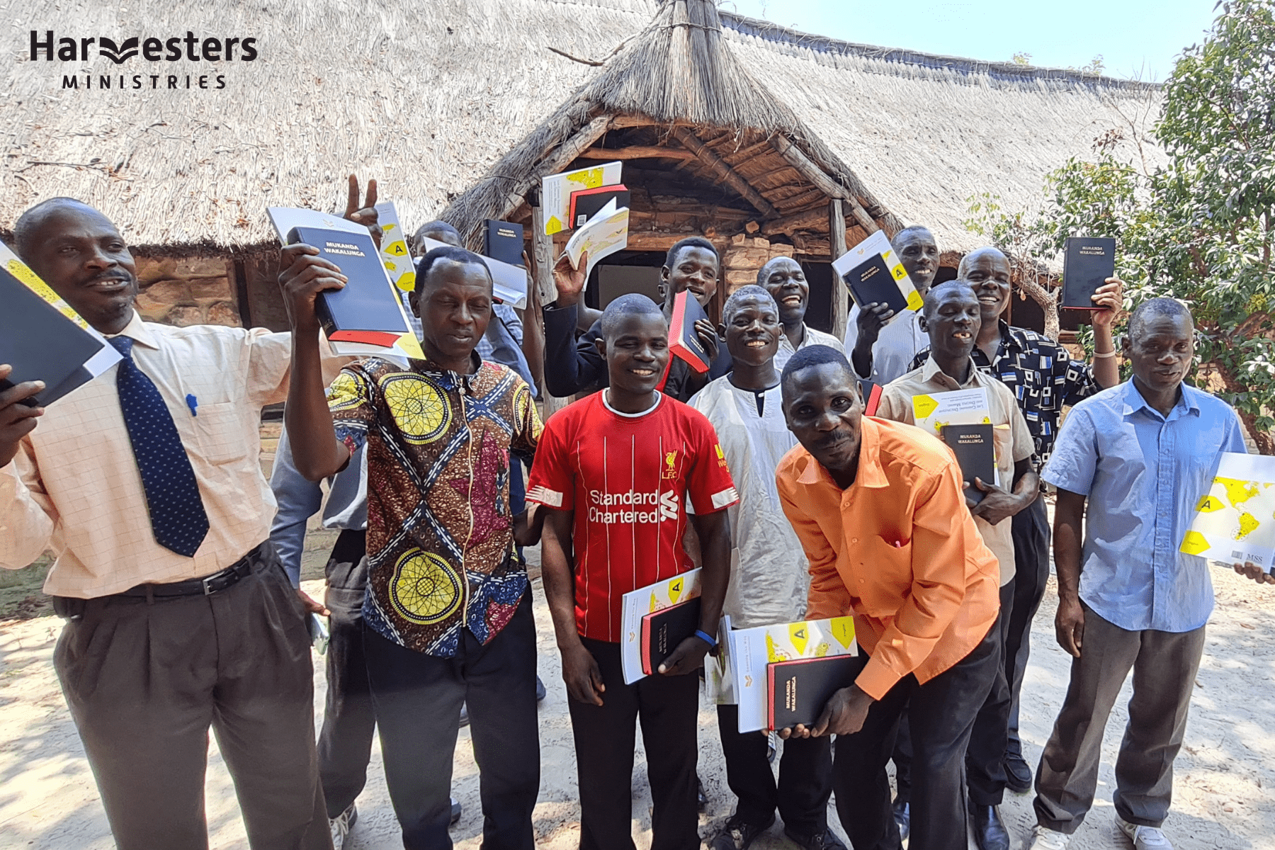 Chavuma students with materials and bibles. Harvesters Ministries