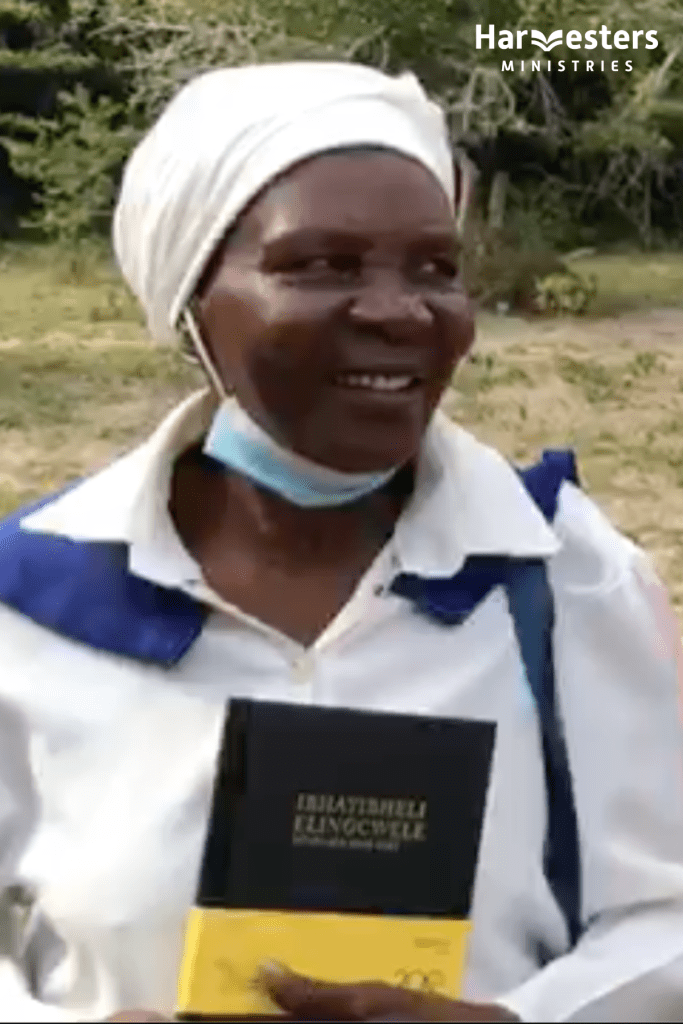 Elizabeth Khumalo received her first bible. Harvesters Ministries.