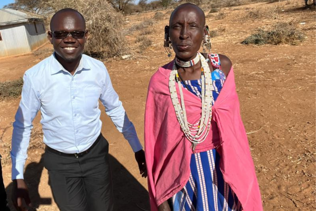 Dylan with Maasai lady. Harvesters Ministries