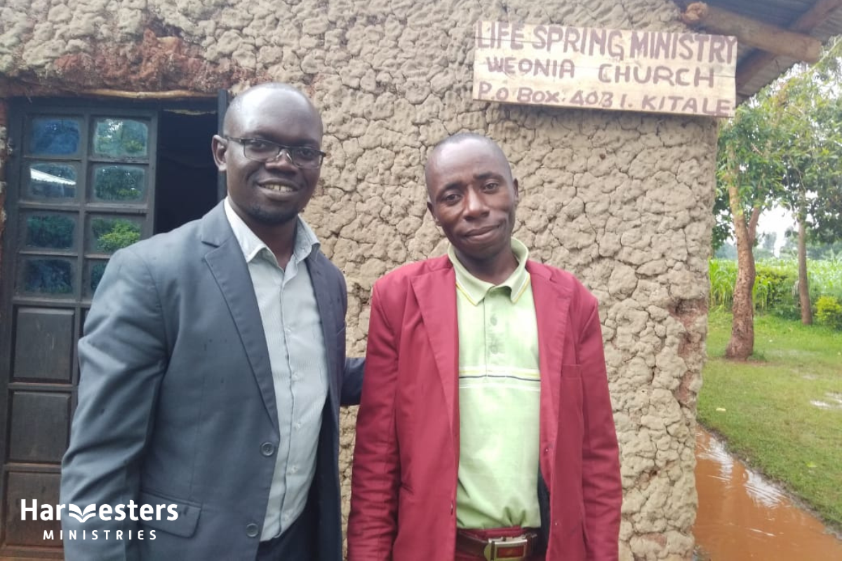 Dylan with pastor who has improved his preaching. Harvesters Ministries