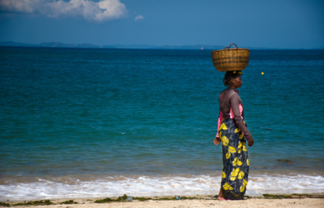 Lady with basket on beach Lady with basket on beach